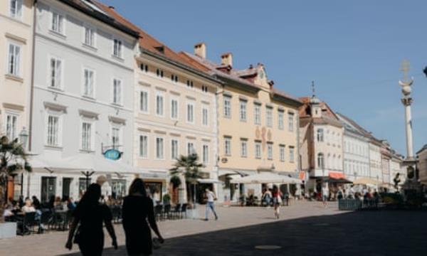 A bustling street scene in Klagenfurt, Austria.