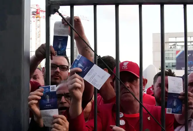 Fans shows tickets in front of the Stade de France prior the Champions League final soccer ma